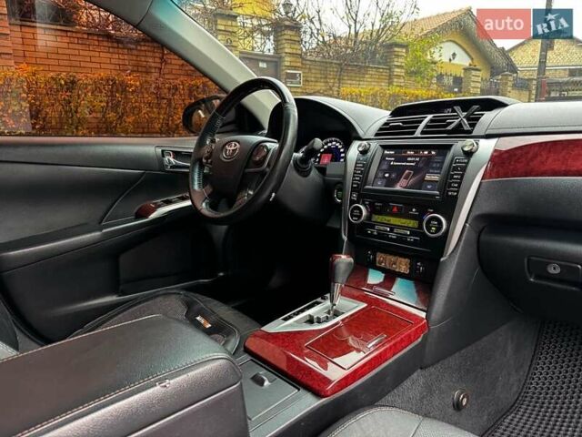 Черный Тойота Камри, объемом двигателя 2.5 л и пробегом 257 тыс. км за 13990 $, фото 34 на Automoto.ua