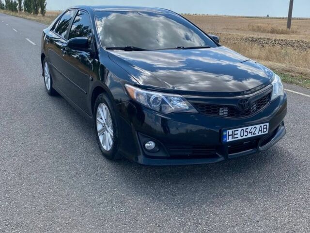 Черный Тойота Камри, объемом двигателя 2.5 л и пробегом 120 тыс. км за 12650 $, фото 2 на Automoto.ua