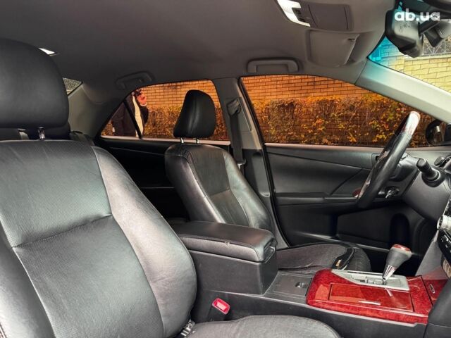 Черный Тойота Камри, объемом двигателя 2.5 л и пробегом 257 тыс. км за 13990 $, фото 33 на Automoto.ua