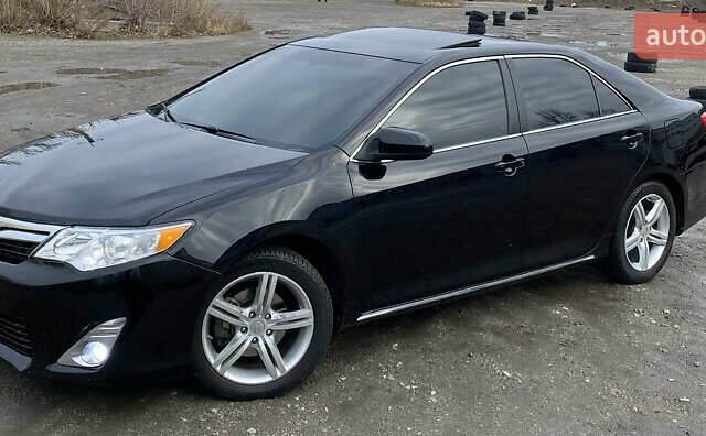 Чорний Тойота Камрі, об'ємом двигуна 2.49 л та пробігом 149 тис. км за 13400 $, фото 4 на Automoto.ua