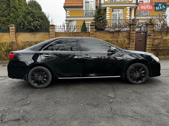 Черный Тойота Камри, объемом двигателя 2.5 л и пробегом 257 тыс. км за 13990 $, фото 7 на Automoto.ua