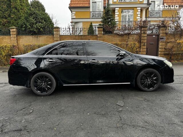 Черный Тойота Камри, объемом двигателя 2.5 л и пробегом 257 тыс. км за 13990 $, фото 7 на Automoto.ua