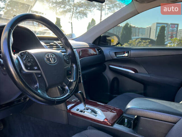 Черный Тойота Камри, объемом двигателя 2.49 л и пробегом 260 тыс. км за 13750 $, фото 9 на Automoto.ua