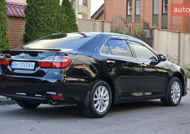 Черный Тойота Камри, объемом двигателя 2.49 л и пробегом 73 тыс. км за 18900 $, фото 1 на Automoto.ua
