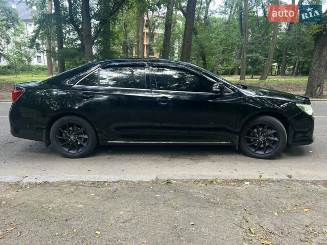 Чорний Тойота Камрі, об'ємом двигуна 2.49 л та пробігом 216 тис. км за 13200 $, фото 4 на Automoto.ua