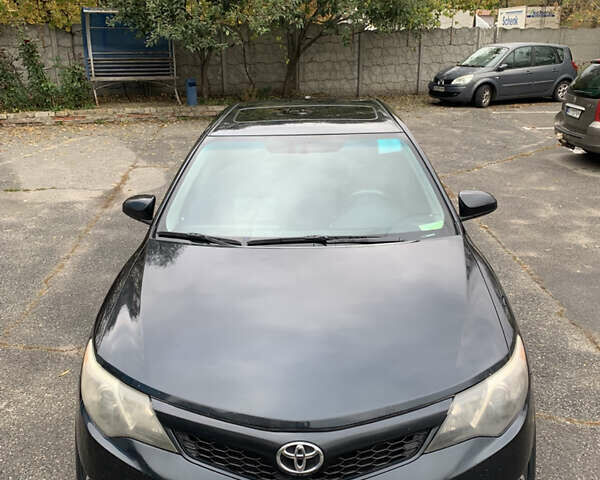 Черный Тойота Камри, объемом двигателя 2.49 л и пробегом 198 тыс. км за 11300 $, фото 8 на Automoto.ua