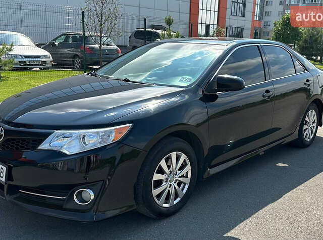 Черный Тойота Камри, объемом двигателя 2.5 л и пробегом 202 тыс. км за 13000 $, фото 2 на Automoto.ua