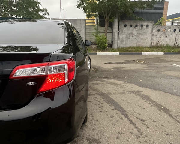 Черный Тойота Камри, объемом двигателя 2.5 л и пробегом 240 тыс. км за 14000 $, фото 12 на Automoto.ua