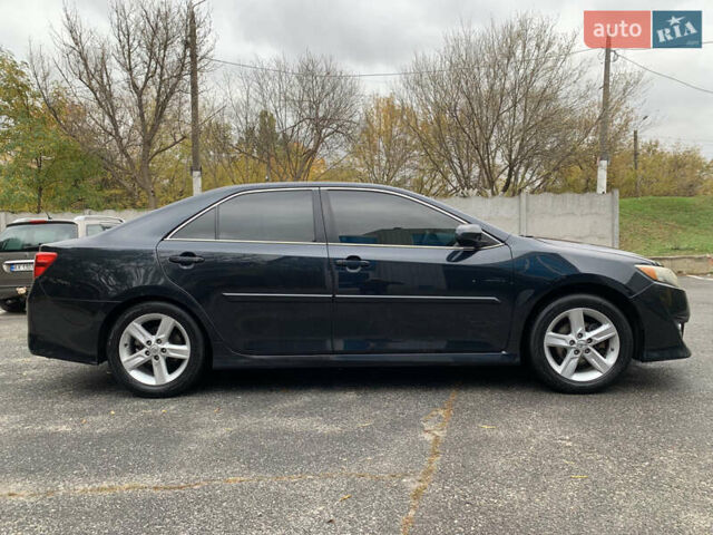 Черный Тойота Камри, объемом двигателя 2.49 л и пробегом 198 тыс. км за 11300 $, фото 3 на Automoto.ua