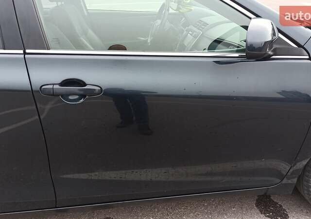 Чорний Тойота Камрі, об'ємом двигуна 2.49 л та пробігом 195 тис. км за 12100 $, фото 7 на Automoto.ua