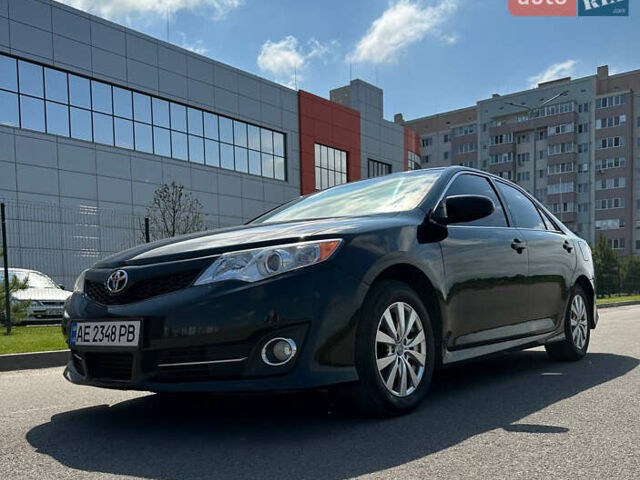 Черный Тойота Камри, объемом двигателя 2.5 л и пробегом 202 тыс. км за 13000 $, фото 4 на Automoto.ua