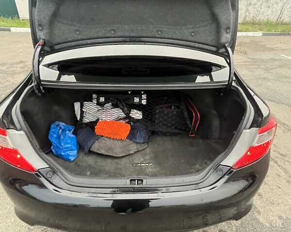 Черный Тойота Камри, объемом двигателя 2.5 л и пробегом 240 тыс. км за 14000 $, фото 24 на Automoto.ua