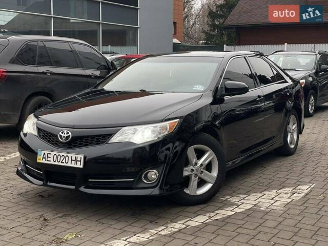 Черный Тойота Камри, объемом двигателя 2.49 л и пробегом 210 тыс. км за 12300 $, фото 2 на Automoto.ua