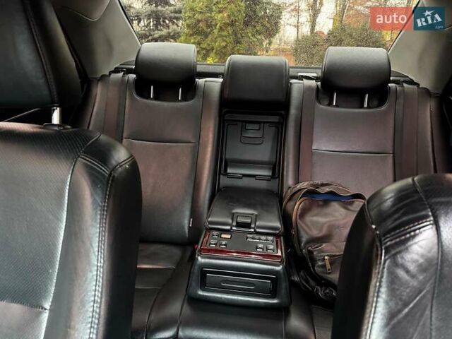 Черный Тойота Камри, объемом двигателя 2.5 л и пробегом 257 тыс. км за 13990 $, фото 24 на Automoto.ua