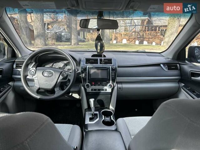 Черный Тойота Камри, объемом двигателя 2.49 л и пробегом 195 тыс. км за 11250 $, фото 13 на Automoto.ua