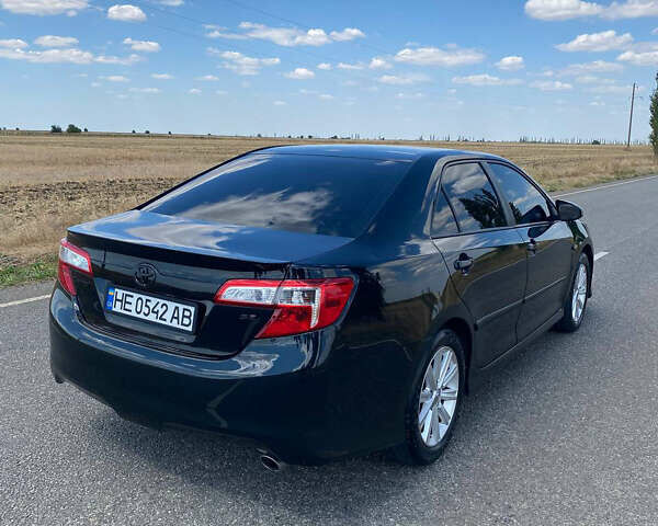 Чорний Тойота Камрі, об'ємом двигуна 2.49 л та пробігом 190 тис. км за 12250 $, фото 4 на Automoto.ua