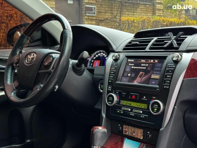 Черный Тойота Камри, объемом двигателя 2.5 л и пробегом 257 тыс. км за 13990 $, фото 35 на Automoto.ua