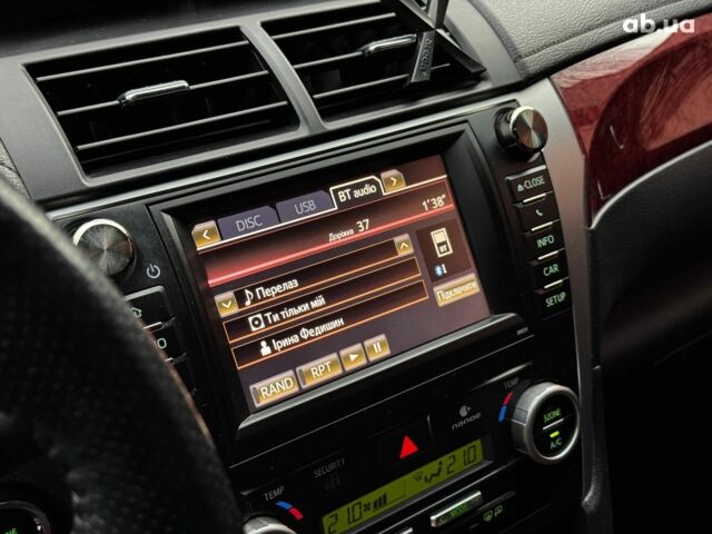 Черный Тойота Камри, объемом двигателя 2.5 л и пробегом 257 тыс. км за 13990 $, фото 21 на Automoto.ua