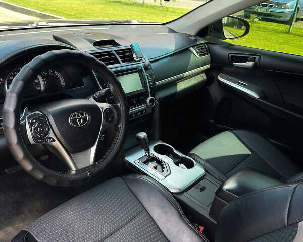 Черный Тойота Камри, объемом двигателя 2.5 л и пробегом 202 тыс. км за 13000 $, фото 8 на Automoto.ua