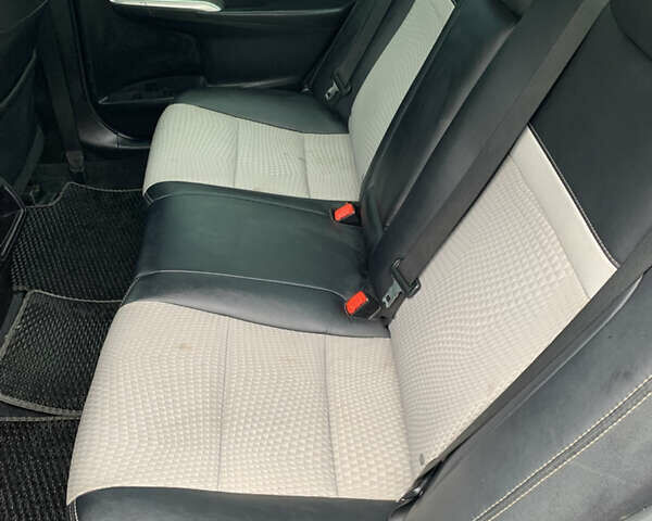 Черный Тойота Камри, объемом двигателя 2.49 л и пробегом 198 тыс. км за 11300 $, фото 12 на Automoto.ua