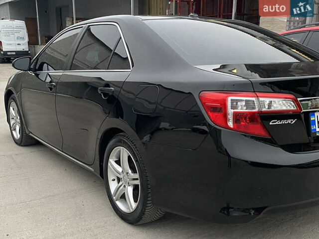 Чорний Тойота Камрі, об'ємом двигуна 2.49 л та пробігом 149 тис. км за 13400 $, фото 2 на Automoto.ua