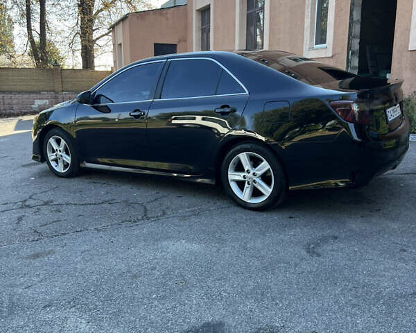 Тойота Камри 2014 в Мироновке на Automoto.ua Черный Тойота Камри, объемом двигателя 2.5 л и пробегом 175 тыс. км за 12600 $, фото 7 на Automoto.ua