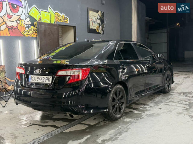 Черный Тойота Камри, объемом двигателя 2.49 л и пробегом 256 тыс. км за 11500 $, фото 15 на Automoto.ua