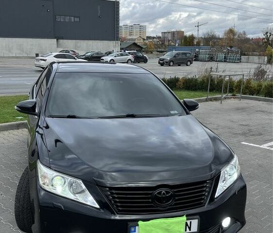 Черный Тойота Камри, объемом двигателя 2.5 л и пробегом 257 тыс. км за 15400 $, фото 22 на Automoto.ua