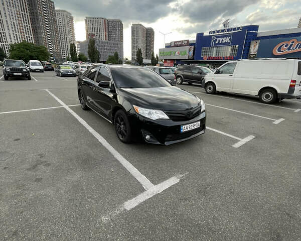 Черный Тойота Камри, объемом двигателя 2.49 л и пробегом 206 тыс. км за 11200 $, фото 7 на Automoto.ua
