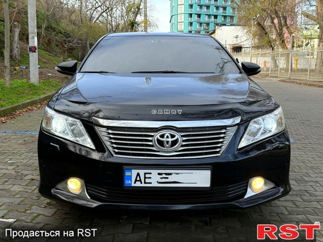 Черный Тойота Камри, объемом двигателя 2.5 л и пробегом 208 тыс. км за 9500 $, фото 1 на Automoto.ua