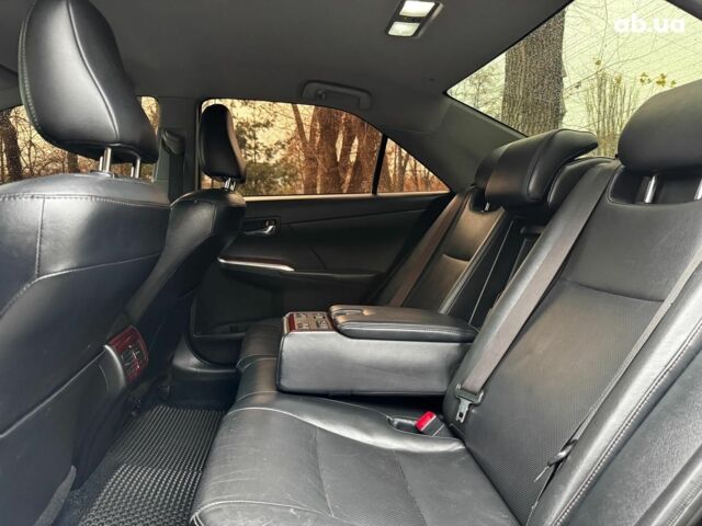 Черный Тойота Камри, объемом двигателя 2.5 л и пробегом 257 тыс. км за 13990 $, фото 27 на Automoto.ua