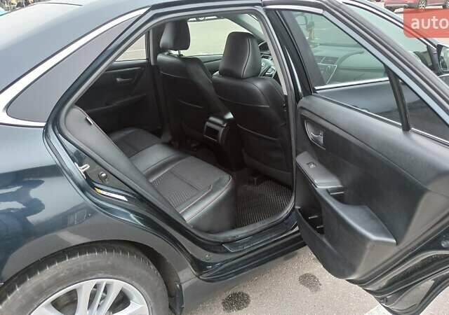 Чорний Тойота Камрі, об'ємом двигуна 2.49 л та пробігом 195 тис. км за 12100 $, фото 26 на Automoto.ua