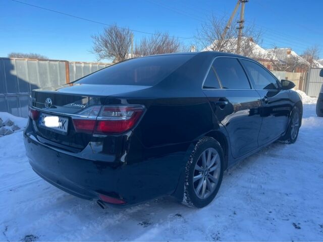 Черный Тойота Камри, объемом двигателя 2.5 л и пробегом 188 тыс. км за 14750 $, фото 3 на Automoto.ua