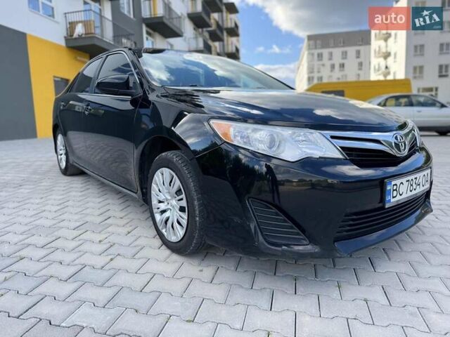 Черный Тойота Камри, объемом двигателя 2.49 л и пробегом 195 тыс. км за 11250 $, фото 3 на Automoto.ua