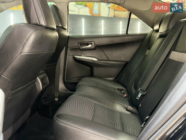 Черный Тойота Камри, объемом двигателя 2.49 л и пробегом 256 тыс. км за 11500 $, фото 12 на Automoto.ua