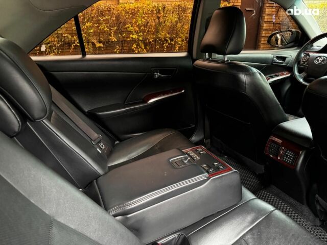 Черный Тойота Камри, объемом двигателя 2.5 л и пробегом 257 тыс. км за 13990 $, фото 32 на Automoto.ua