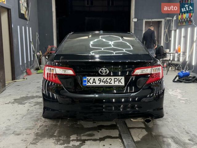 Черный Тойота Камри, объемом двигателя 2.49 л и пробегом 256 тыс. км за 11500 $, фото 14 на Automoto.ua