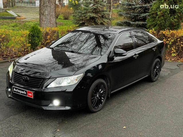 Черный Тойота Камри, объемом двигателя 2.5 л и пробегом 257 тыс. км за 13990 $, фото 4 на Automoto.ua