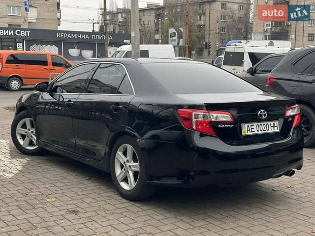 Черный Тойота Камри, объемом двигателя 2.49 л и пробегом 210 тыс. км за 12300 $, фото 5 на Automoto.ua