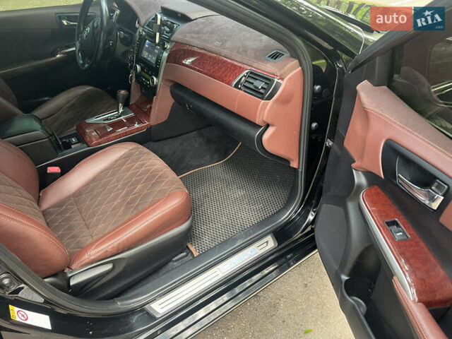 Чорний Тойота Камрі, об'ємом двигуна 2.49 л та пробігом 216 тис. км за 13200 $, фото 14 на Automoto.ua