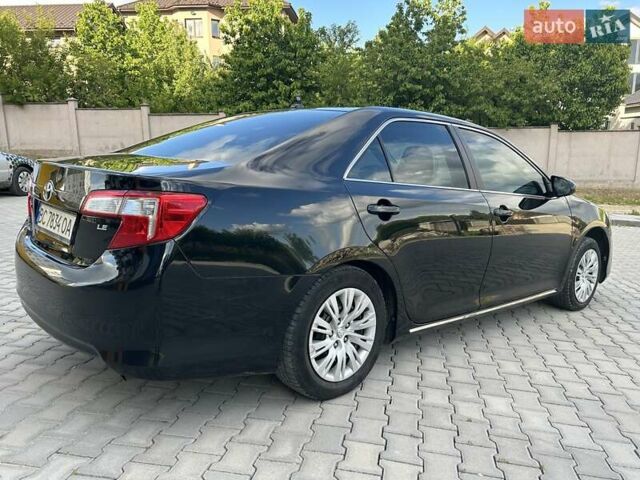 Черный Тойота Камри, объемом двигателя 2.49 л и пробегом 195 тыс. км за 11250 $, фото 10 на Automoto.ua