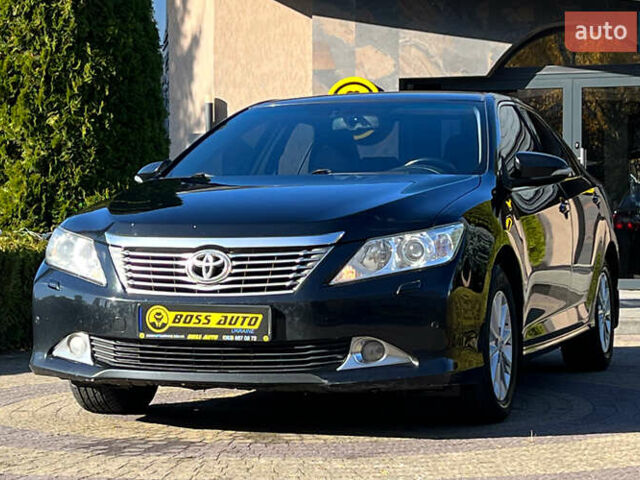 Черный Тойота Камри, объемом двигателя 2.49 л и пробегом 260 тыс. км за 13750 $, фото 2 на Automoto.ua