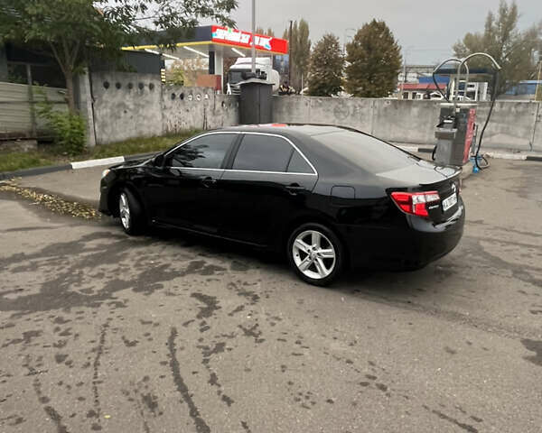 Черный Тойота Камри, объемом двигателя 2.5 л и пробегом 240 тыс. км за 14000 $, фото 14 на Automoto.ua