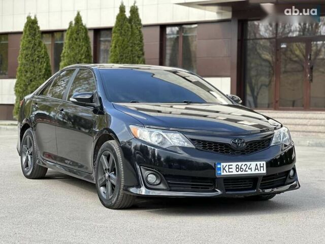 Черный Тойота Камри, объемом двигателя 2.5 л и пробегом 180 тыс. км за 11999 $, фото 20 на Automoto.ua