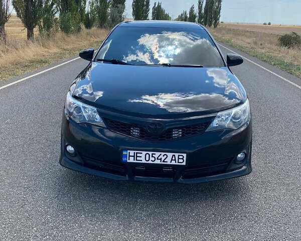 Чорний Тойота Камрі, об'ємом двигуна 2.49 л та пробігом 190 тис. км за 12250 $, фото 1 на Automoto.ua