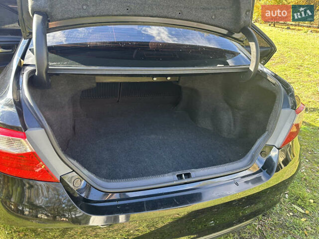 Чорний Тойота Камрі, об'ємом двигуна 2.49 л та пробігом 250 тис. км за 14500 $, фото 3 на Automoto.ua