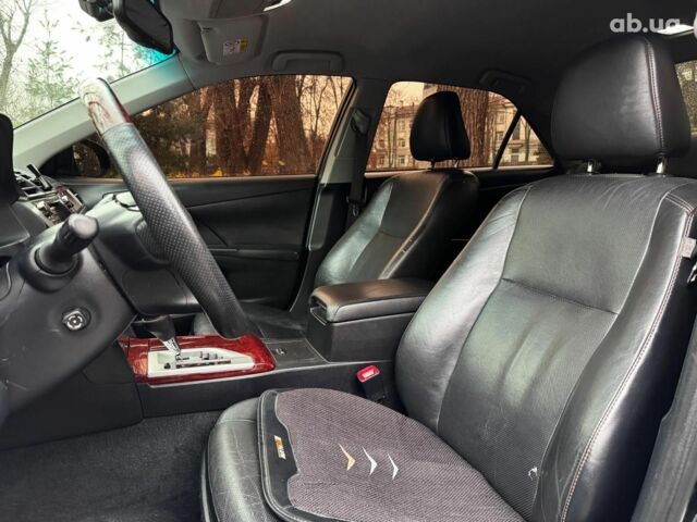 Черный Тойота Камри, объемом двигателя 2.5 л и пробегом 257 тыс. км за 13990 $, фото 23 на Automoto.ua