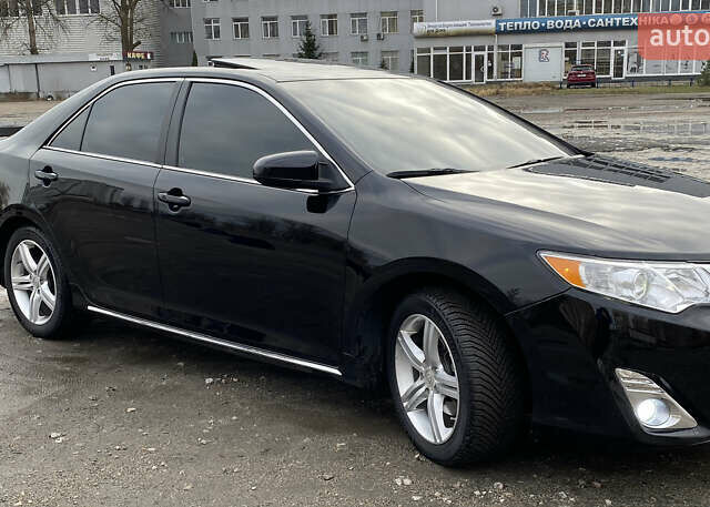 Чорний Тойота Камрі, об'ємом двигуна 2.49 л та пробігом 149 тис. км за 13400 $, фото 3 на Automoto.ua