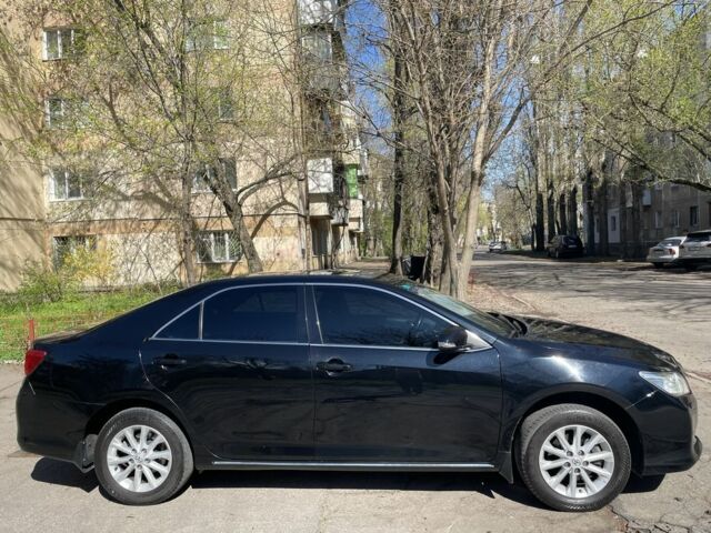 Черный Тойота Камри, объемом двигателя 0.25 л и пробегом 292 тыс. км за 15400 $, фото 14 на Automoto.ua