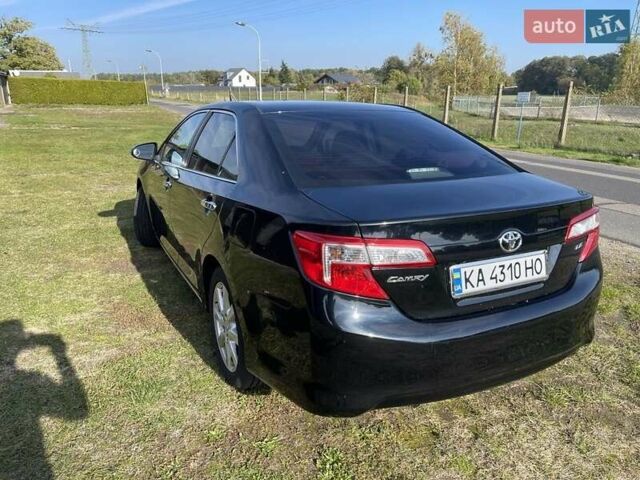 Черный Тойота Камри, объемом двигателя 2.5 л и пробегом 130 тыс. км за 11500 $, фото 2 на Automoto.ua